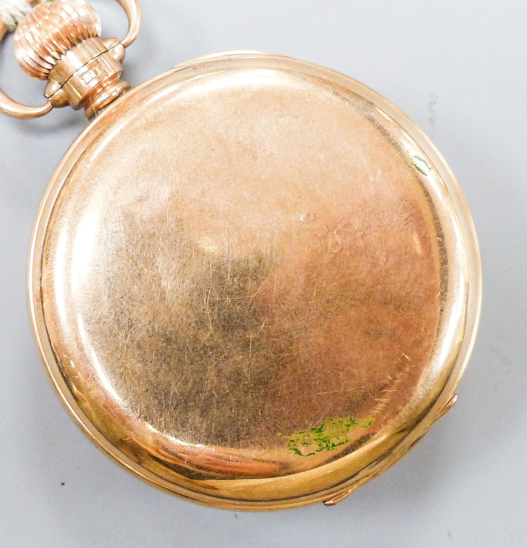 An early 20th century Swiss 9ct gold open faced keyless pocket watch, movement signed Record W. Co, case diameter 48mm, gross weight 77.6 grams.